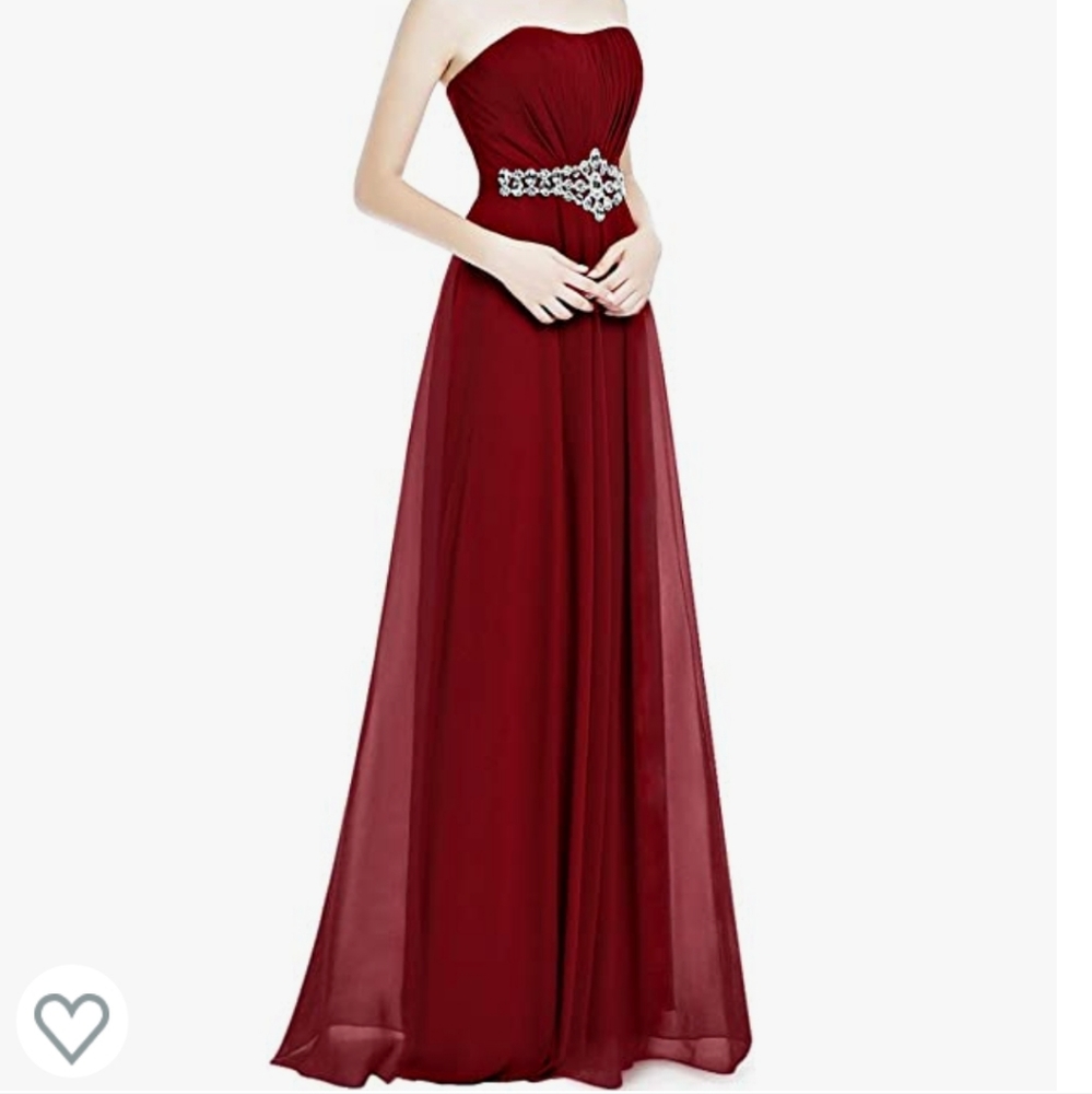 Strapless gown w/corsette back.  Never worn  Arrived too late Size 6.  Wine red.